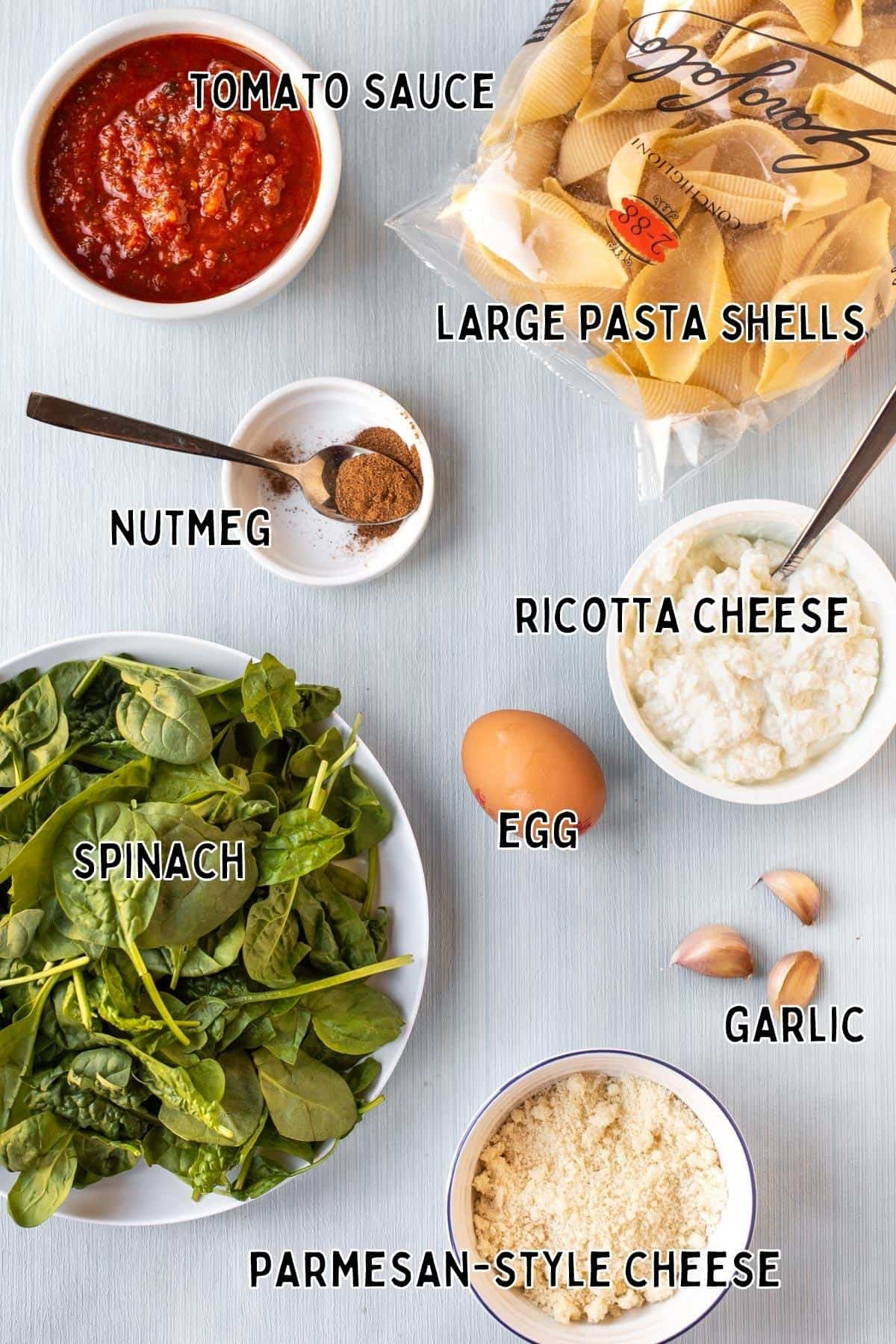 Ingredients needed for spinach and ricotta stuffed shells, with labels.