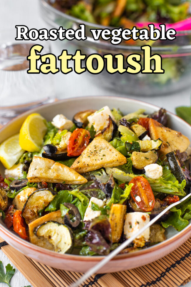 A bowlful of roasted vegetable fattoush topped with crispy pitta chips.