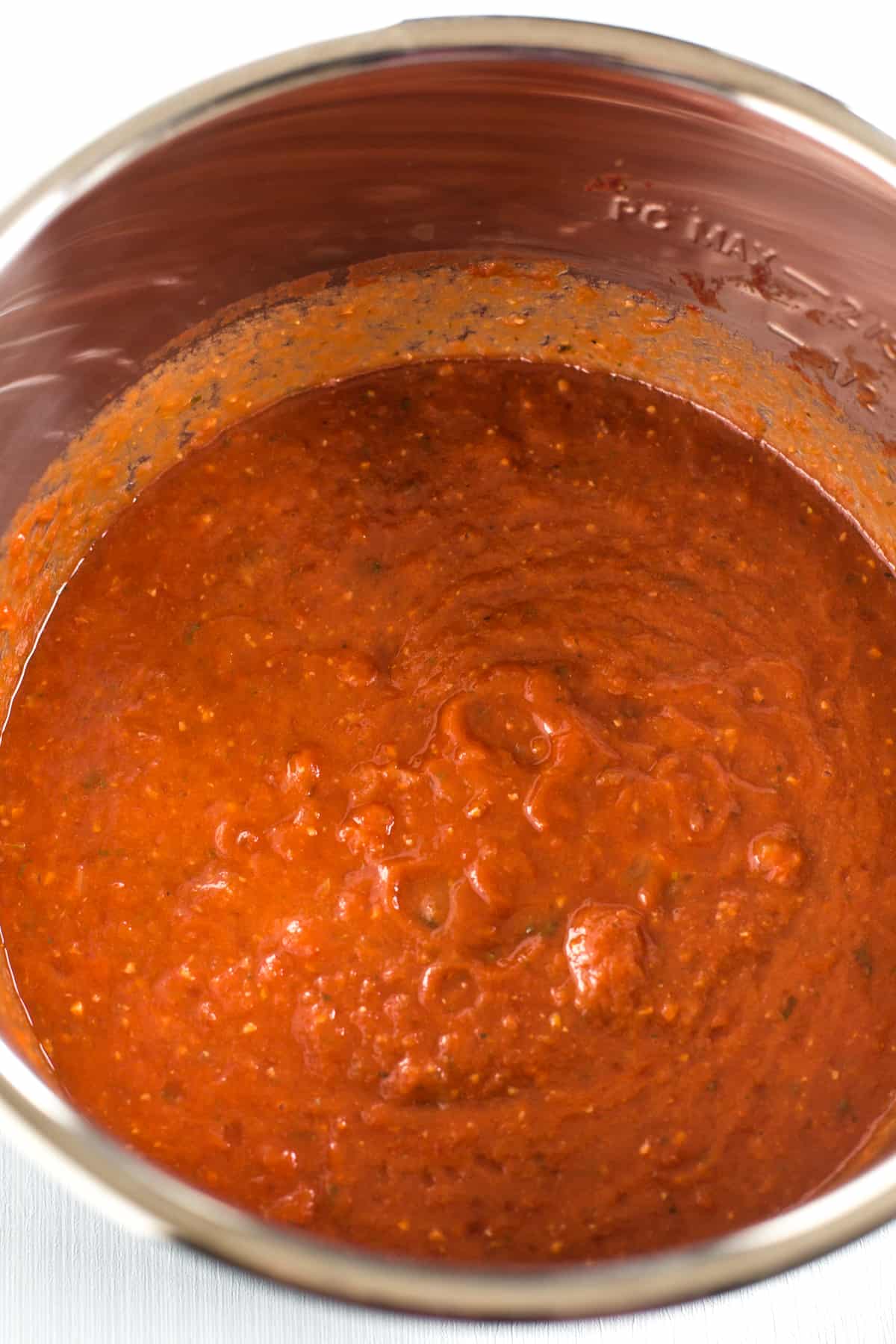 Blended slow cooker tomato sauce in the pot.