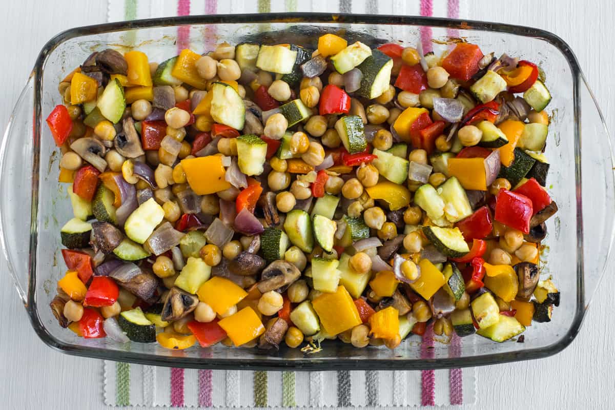 Roasted vegetables and chickpeas in a baking dish
