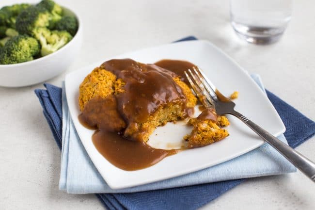 Veggie cutlet on a plate with gravy