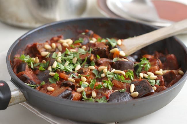 Aubergine stew with olives and capers