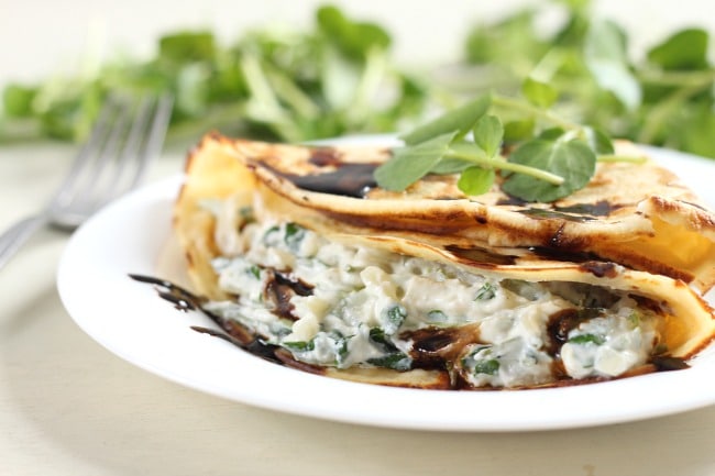 Creamy watercress stuffed crêpes with balsamic reduction