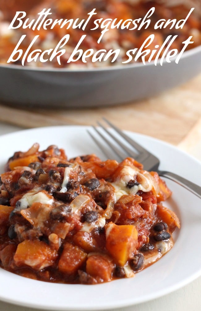 Butternut squash and black bean skillet - a hearty, autumnal one-pot meal with squash, beans, and loads of gooey cheese!