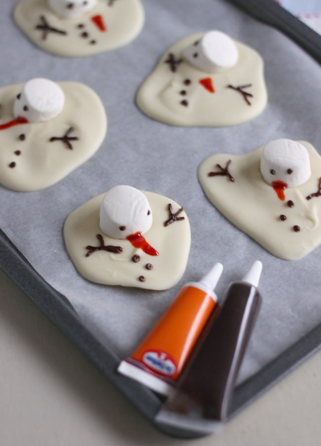 Melted chocolate snowmen - easy, adorable, and a great way to get kids into the kitchen!
