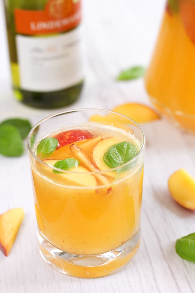Peach and basil white sangria - take a sip, close your eyes and say 'ahhh!'