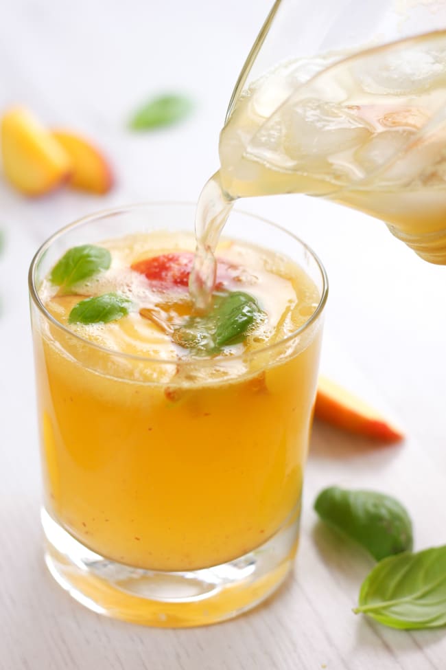 Peach and basil white sangria - take a sip, close your eyes and say 'ahhh!'