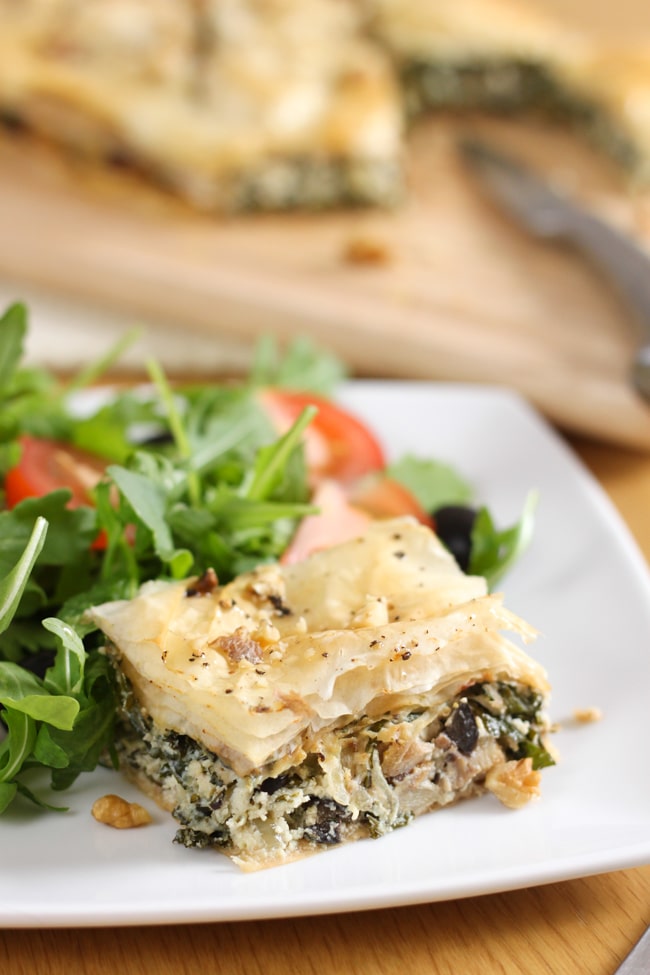 Kale and mushroom savoury baklava - crispy filo pastry stuffed with a creamy savoury filling, drizzled with honey and sprinkled with chopped nuts.