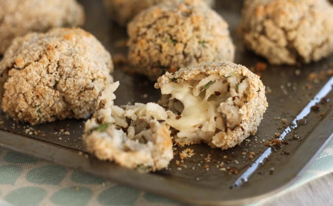 Mozzarella-stuffed aubergine and rice balls. I've always wanted to make arancini, but never have any leftover risotto - these are a much easier way to make them! The gooey mozzarella inside is enough to make you swoon :)