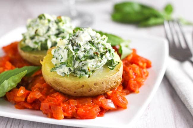 Spinach and ricotta stuffed potatoes with tomato sauce