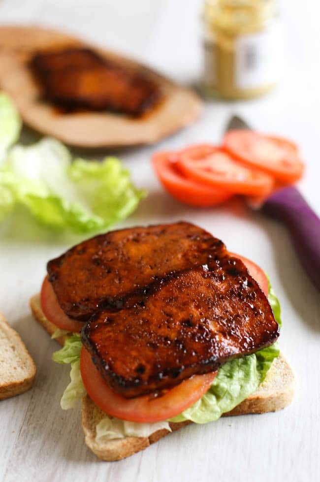 Tofu bacon BLTs - this tofu bacon is SO good! Smoky, spicy, sticky, sweet... and it's easy to make too! Perfect served in a classic BLT sandwich :) Tofu bacon is vegan and gluten-free.