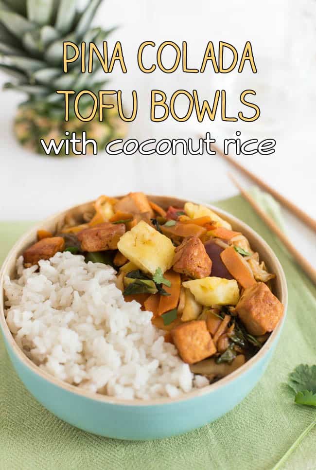 A turquoise bowl filled with a tofu and vegetable stir fry and coconut rice.