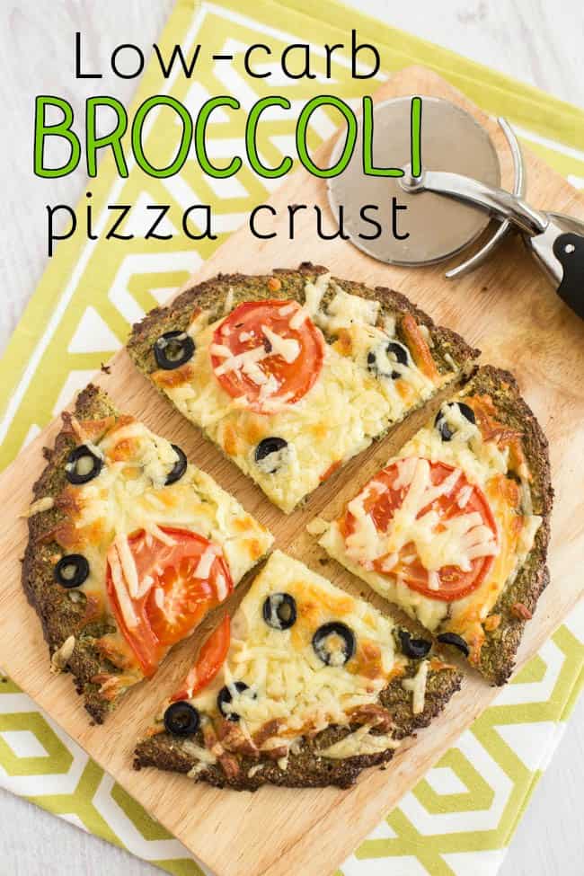 A broccoli crust pizza cut into quarters.
