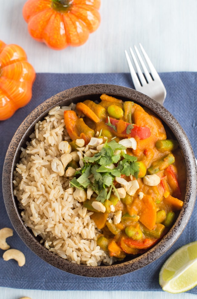 Creamy pumpkin curry with red Thai curry paste - what better way to get into the autumn spirit! Such a comforting, warming, spicy dinner. Vegetarian, vegan and gluten-free!