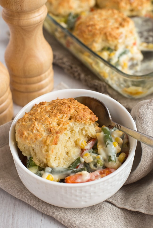 Vegetable cobbler from my Granny's old handwritten cookbook! Only the best recipes are passed down through the generations, and this one's a real winner. A creamy vegetable casserole with cheesy scone topping - vegetarian comfort food at its finest.