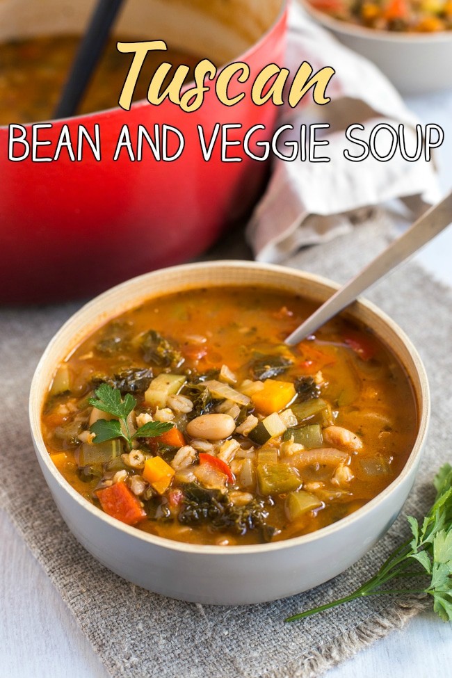 Tuscan bean and veggie soup - a super hearty vegetarian / vegan soup that's full of veggies, barley and beans! Comfort food made healthy!