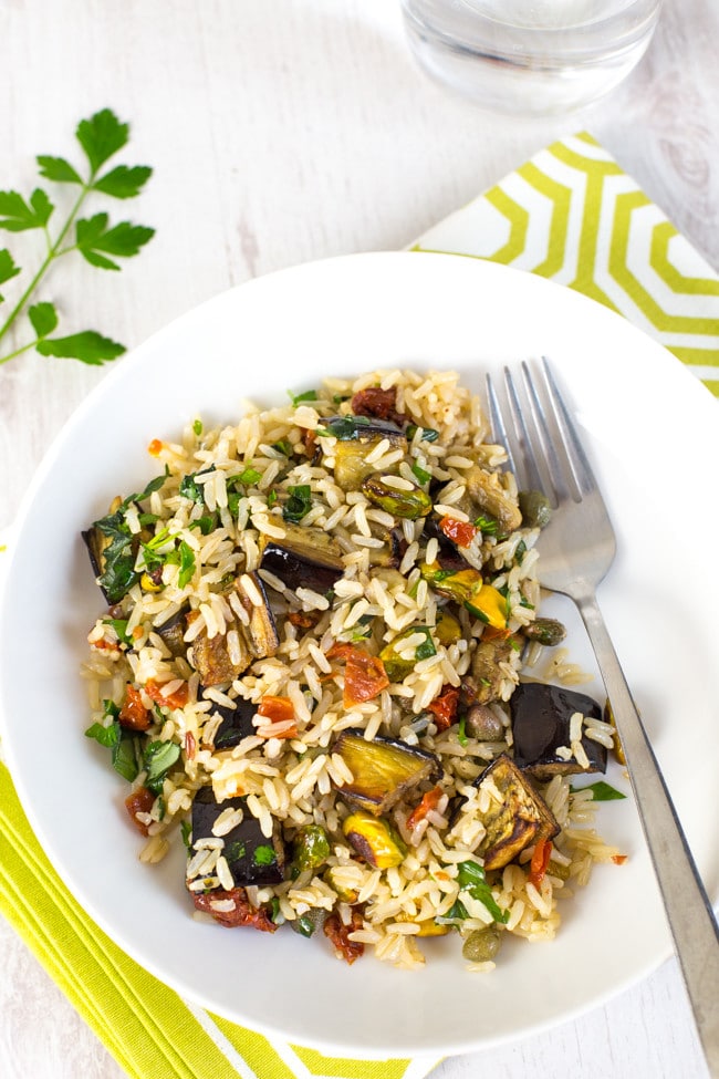 Warm brown rice salad with roasted aubergine and pistachios - a seriously tasty and healthy vegan / vegetarian lunch or dinner!