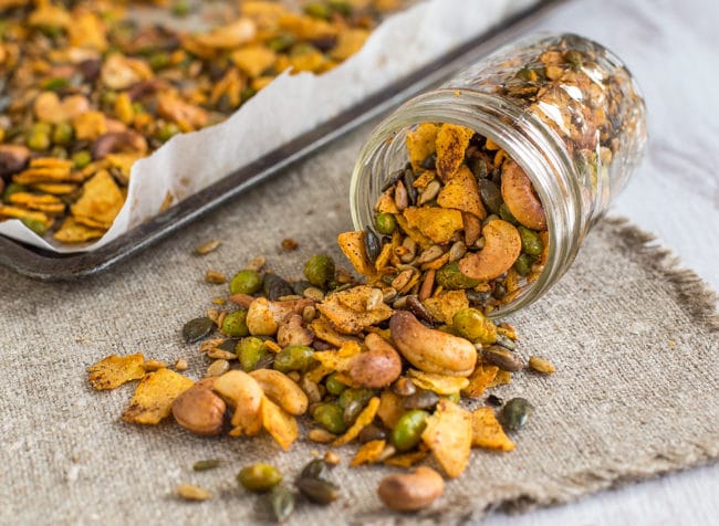 Cajun spiced savoury trail mix - with crispy nuts and seeds, roasted edamame, and crushed tortilla chips! All roasted up in an easy Cajun spice mix. It's high protein, vegan, vegetarian, gluten-free, AND totally delicious!