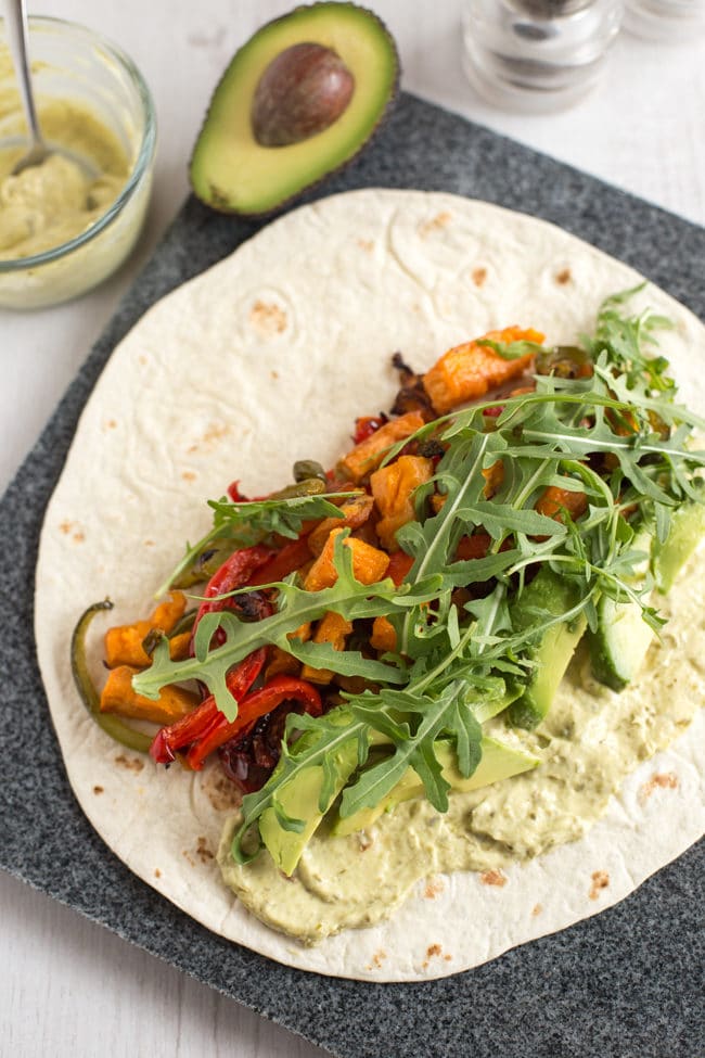 Avocado and sweet potato wraps with basil pesto mayonnaise and rocket - such a simple combination, but so tasty! Perfect for a vegetarian / vegan lunch.