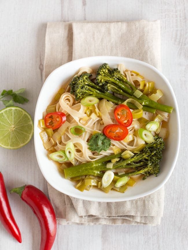 Asian broccoli noodle soup - a slurpy noodle soup with Tenderstem broccoli, leeks and rice noodles. Such a tasty vegan broth!