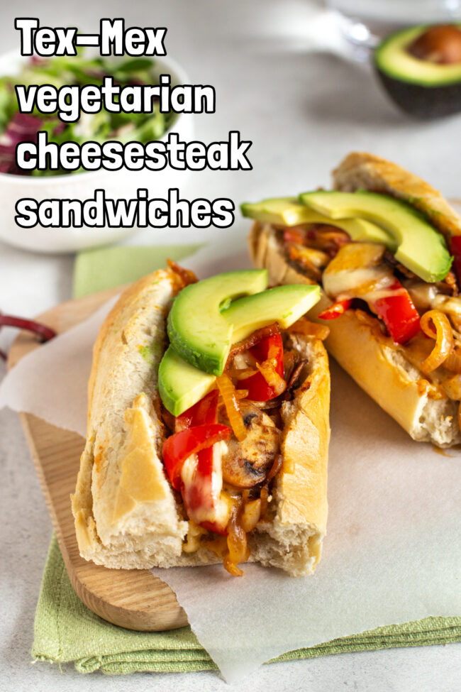 A vegetarian cheesesteak sandwich topped with avocado.