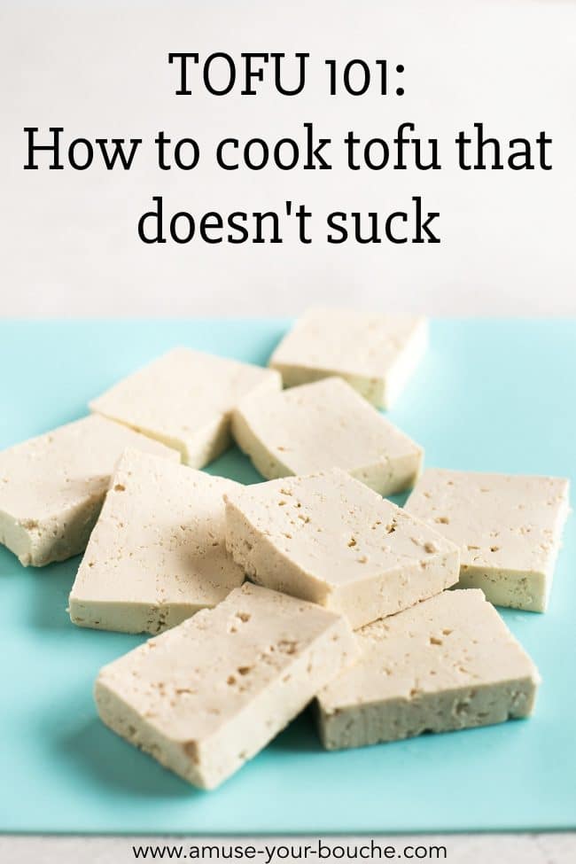 A pile of tofu pieces on a pale blue board