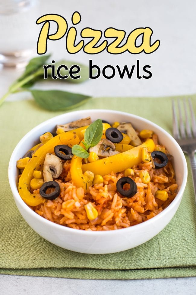 Vegetarian pizza rice in a white bowl topped with peppers and black olives