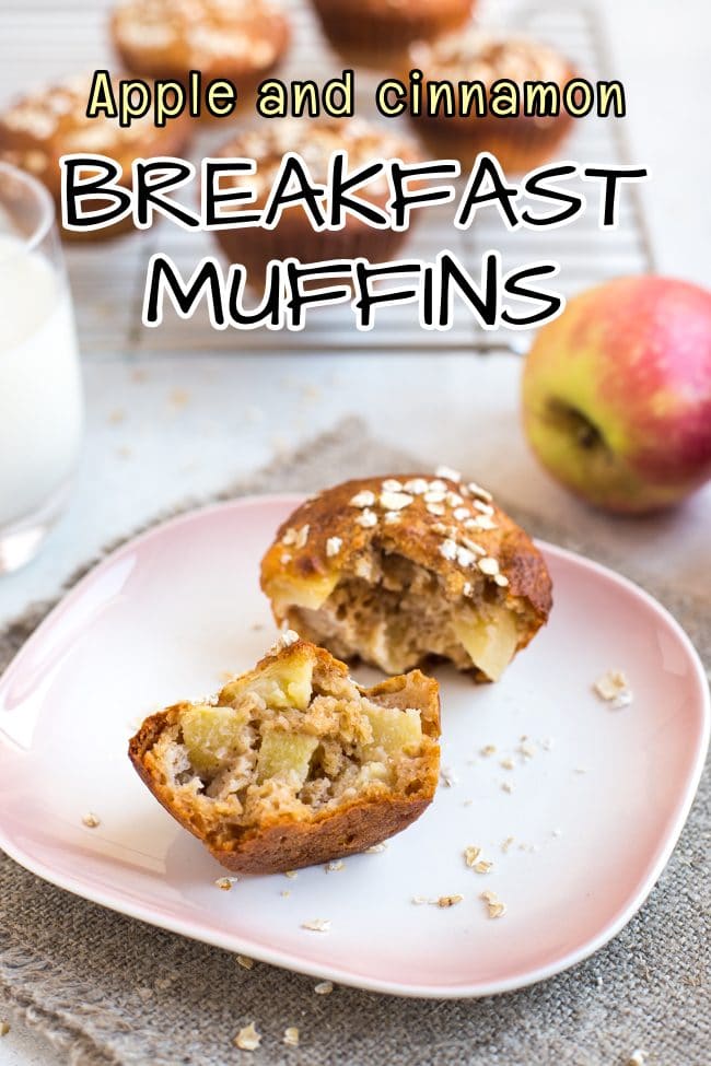 Apple and cinnamon breakfast muffin torn in half on a pink plate