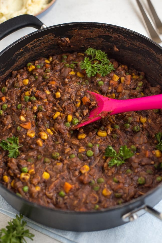 Homemade vegetarian savoury mince in a frying pan with peas and sweetcorn