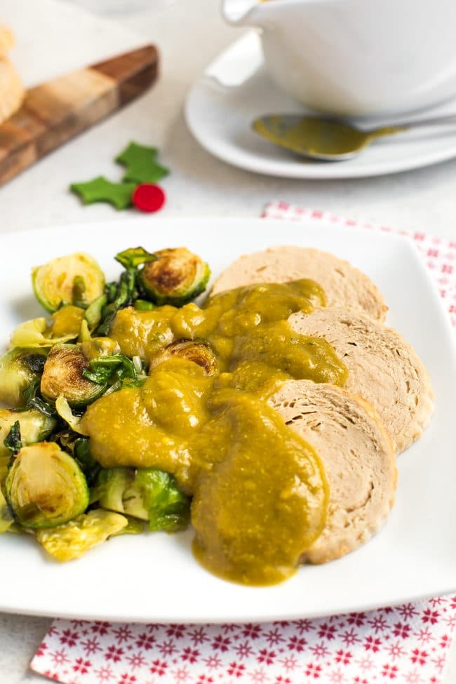 Vegan vegetable gravy over a Quorn roast and Brussels sprouts