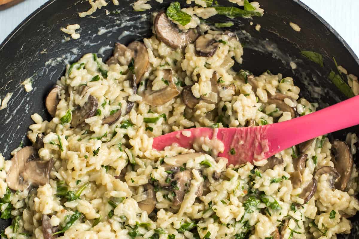 Close-up of mushroom risotto in a wok.