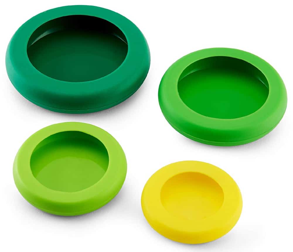 A set of green and yellow food huggers on a white background.