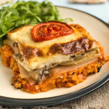 Portion of vegetarian moussaka on a plate.