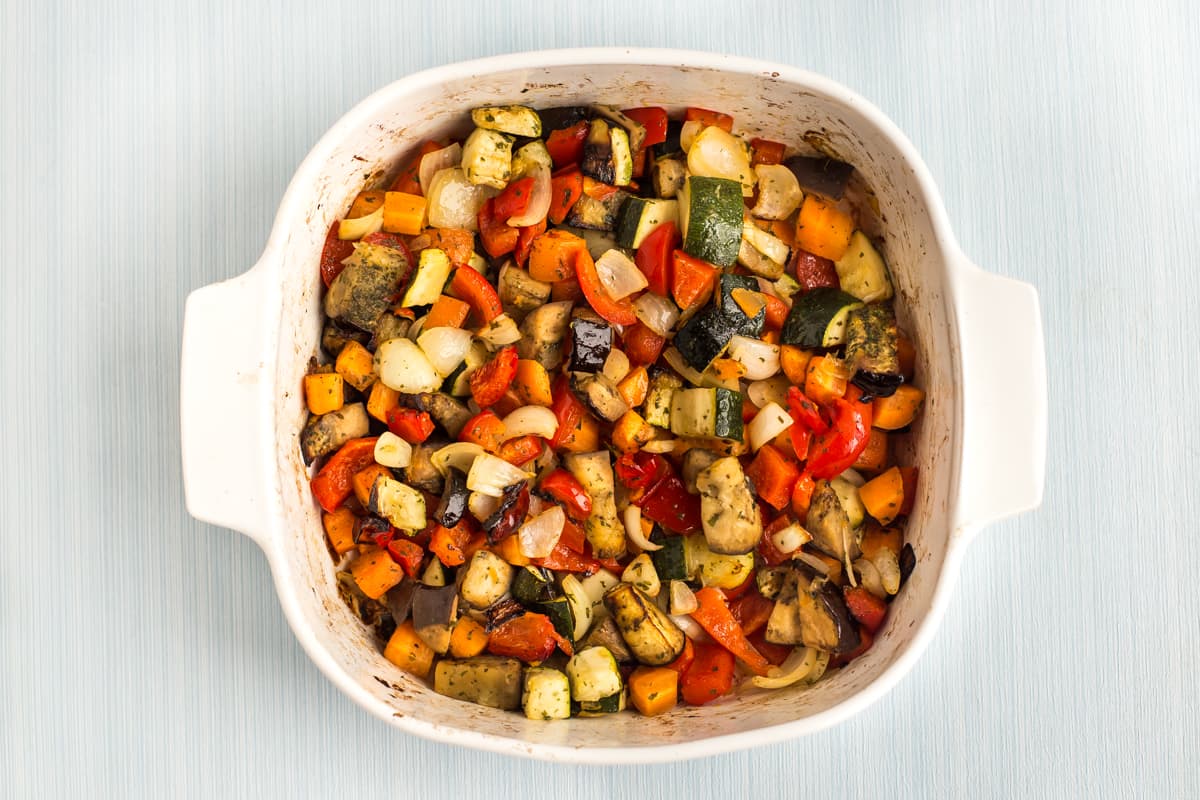 Roasted vegetables in a baking dish.