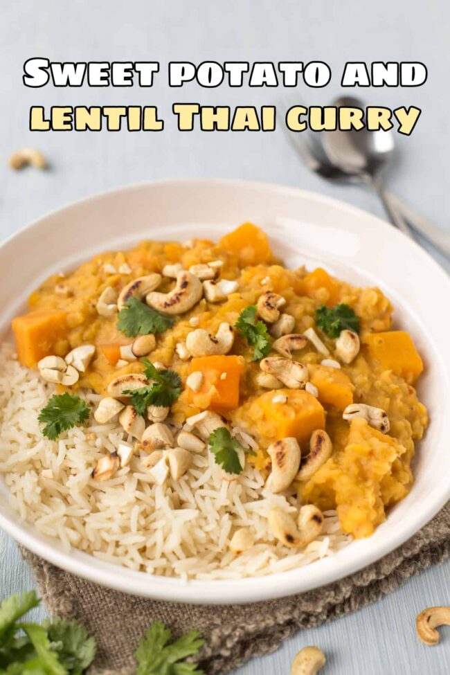 Sweet potato and lentil Thai curry in a bowl with rice and toasted cashew nuts.
