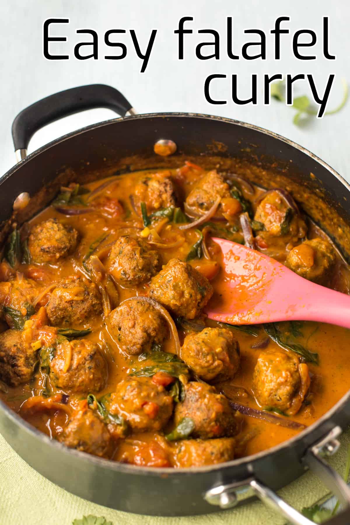 Falafel curry in a large frying pan.