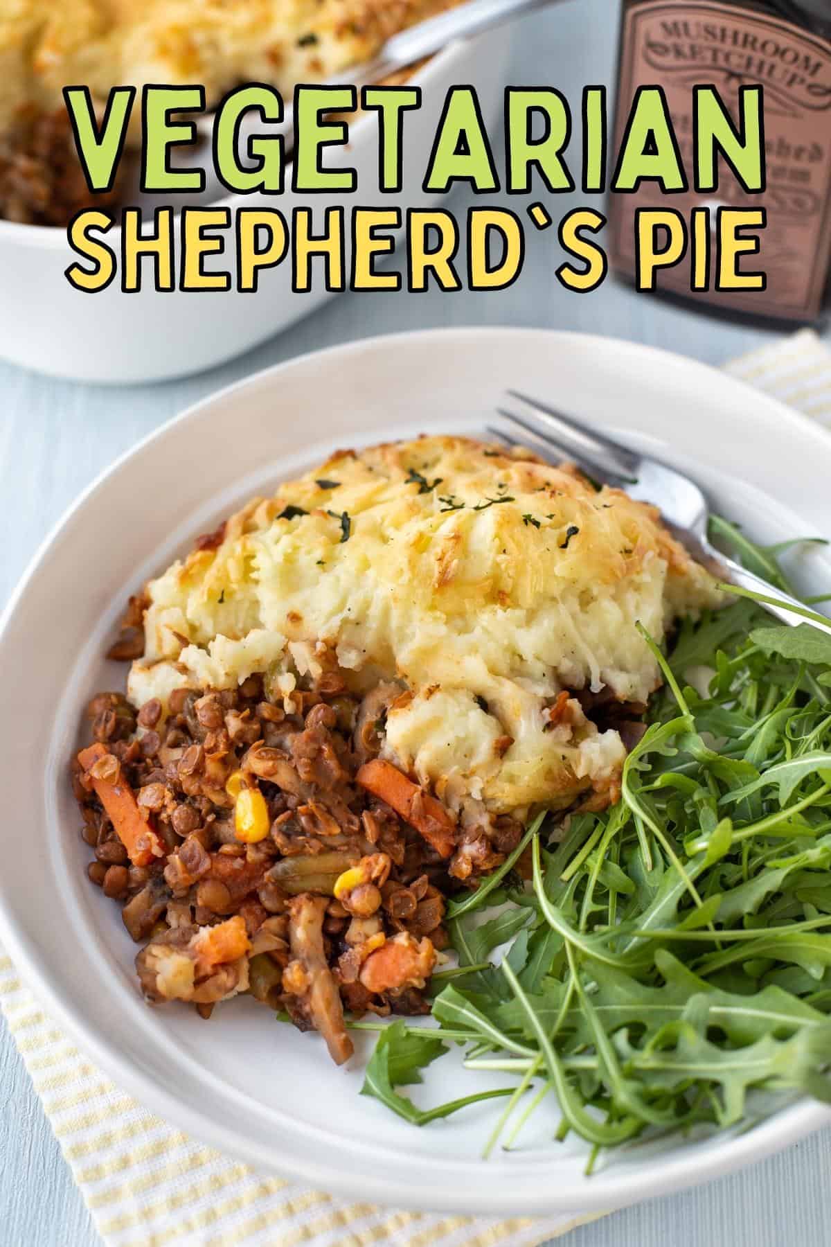 A portion of vegetarian shepherd's pie on a plate with fresh rocket.