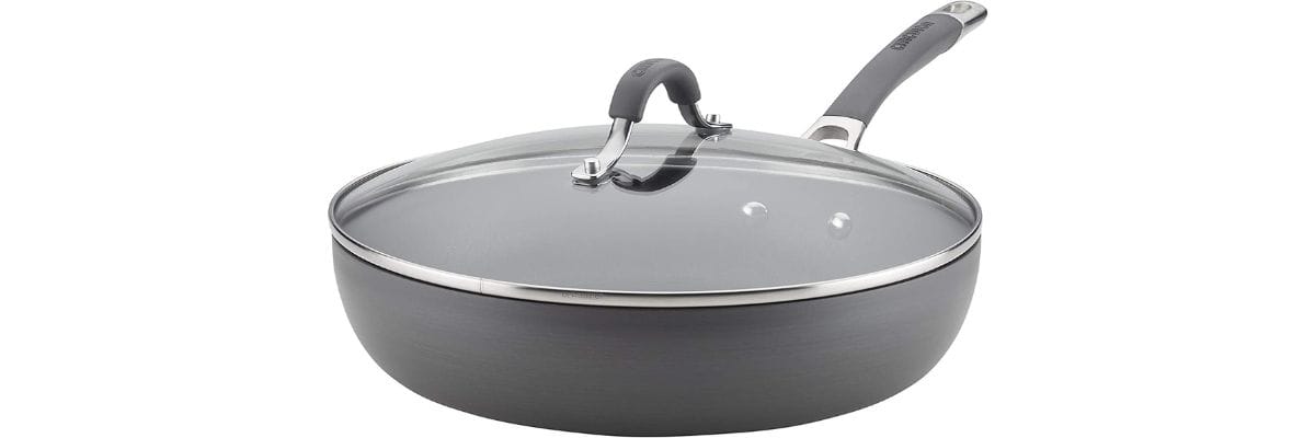 An oven-safe non-stick frying pan with a lid, on a white background.