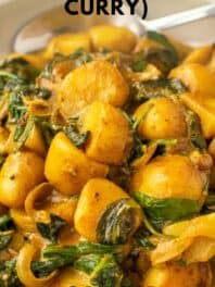 Saag aloo pin with text overlay.