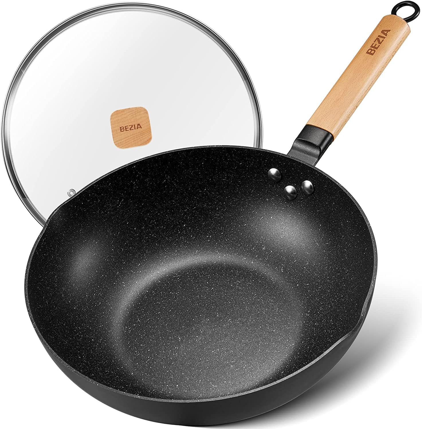 A non-stick wok with a lid on a white background.