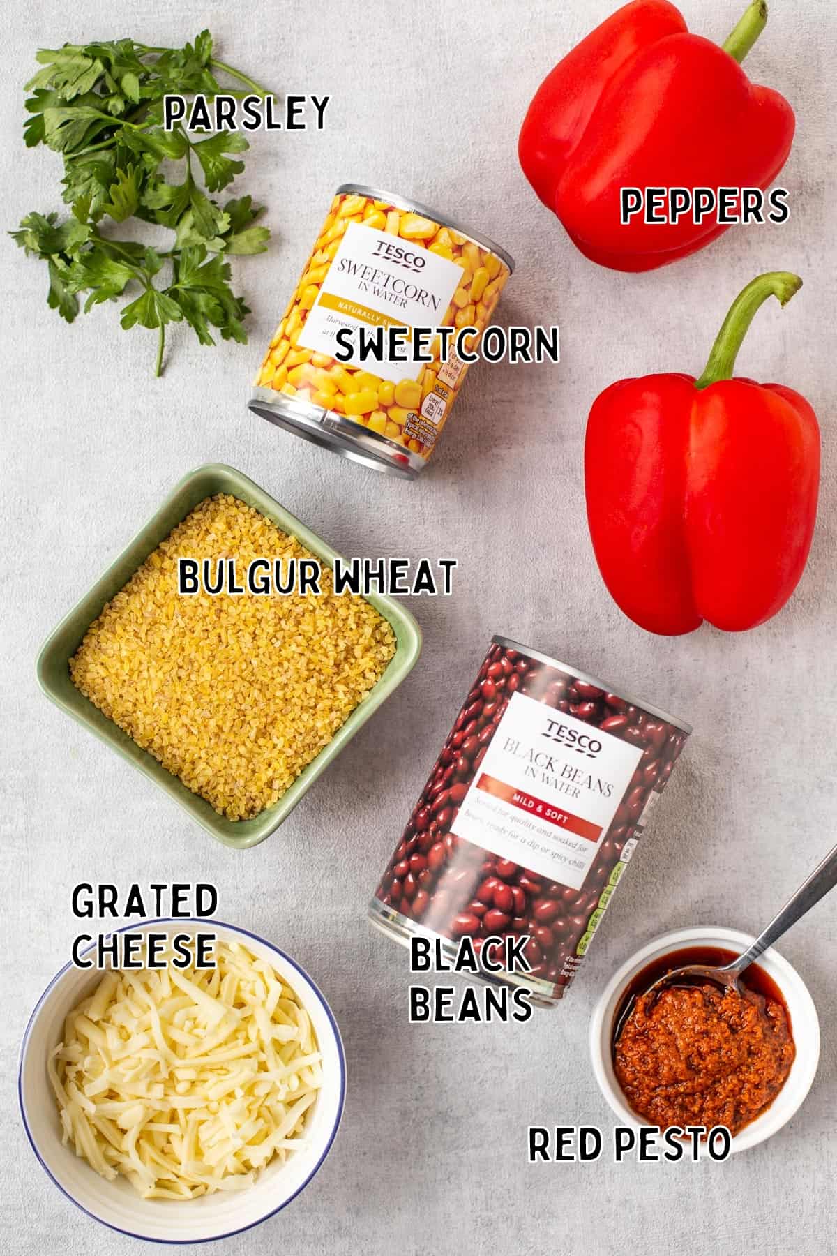 Ingredients for vegetarian stuffed peppers with text overlay.