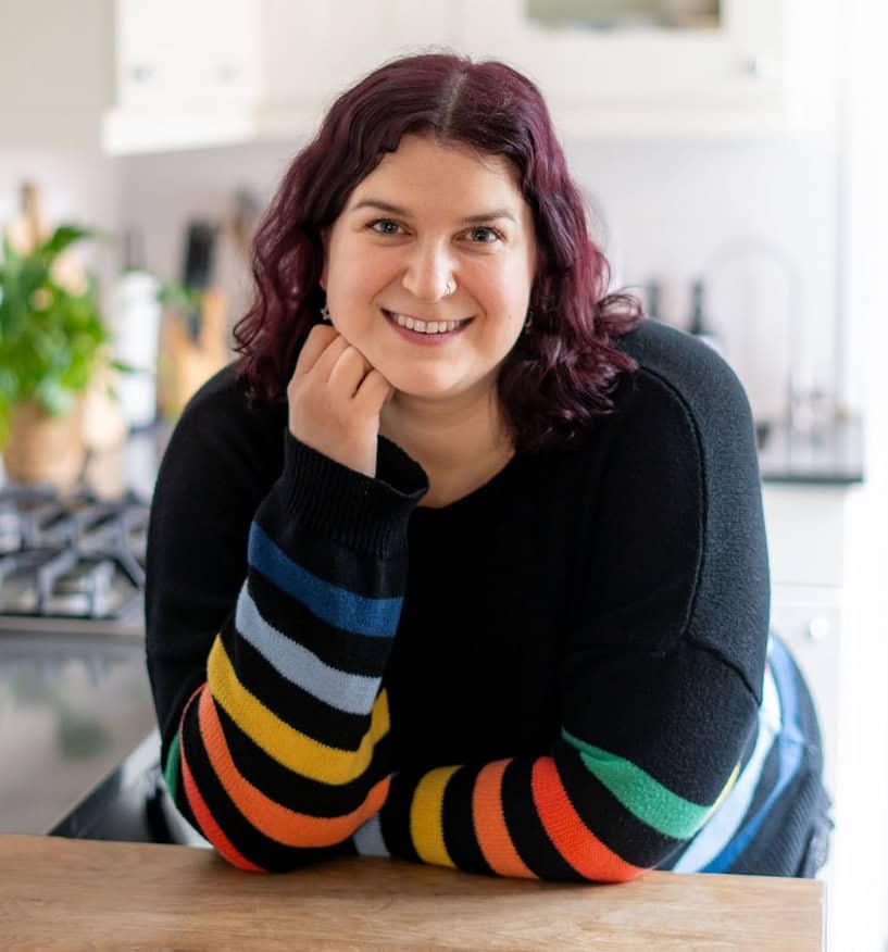 Vegetarian food blogger Becca Heyes in a kitchen.