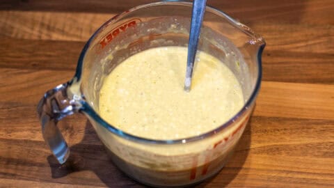 Crustless quiche mixture in a measuring jug.