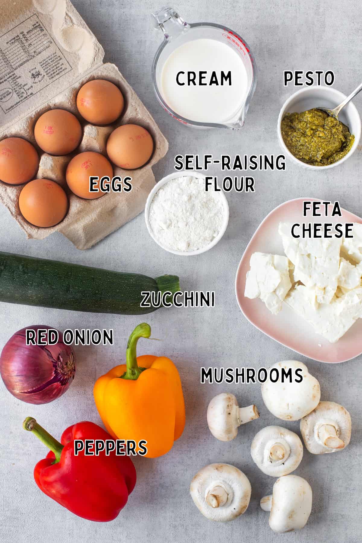 Ingredients for feta and roasted vegetable crustless quiche laid out with text overlay.