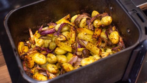 Crispy gnocchi and vegetables in an air fryer.