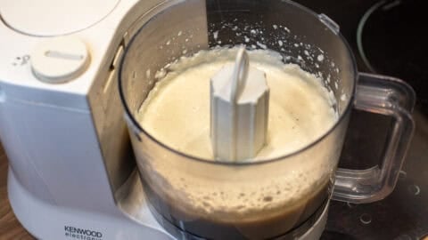 Creamy blended tofu in a food processor.