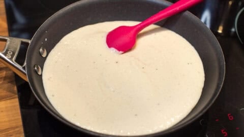 Creamy blended tofu in a frying pan.