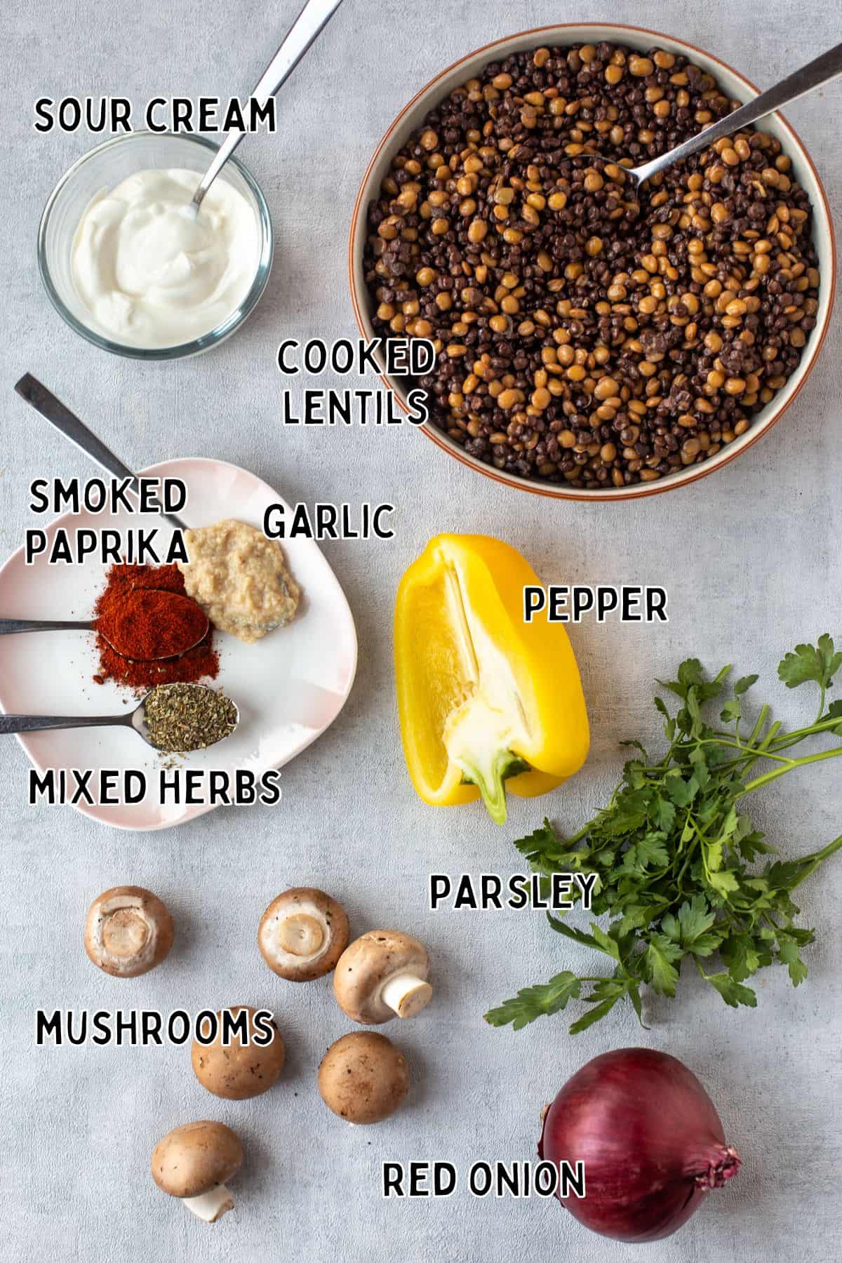 Ingredients for lentil stroganoff laid out with text overlay.