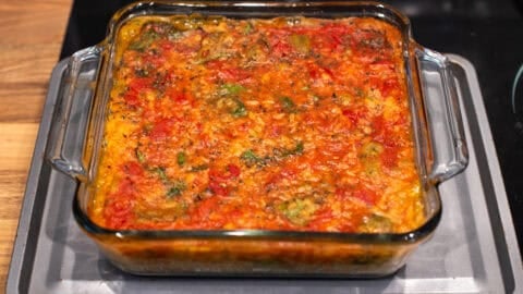 Tomato baked orzo in a baking dish.