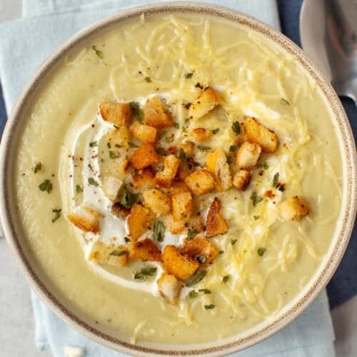 Creamy cauliflower cheese soup with croutons.